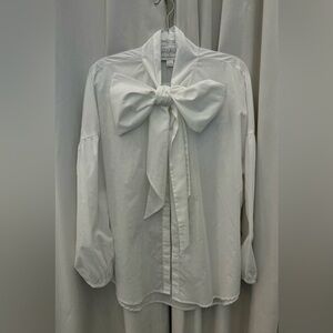 Anthropologie white long sleeve top with big Bow tie